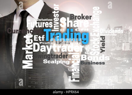 Trading wordcloud touchscreen è mostrato da parte dell'imprenditore. Foto Stock