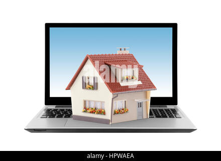 Casa su computer portatile isolato su bianco Foto Stock