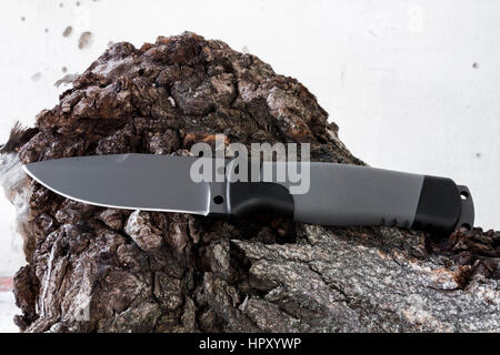 Coltello con una lama fissa. Lama di scure. Foto Stock