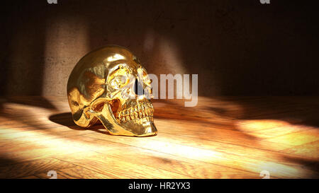 Golden skull su legno Foto Stock