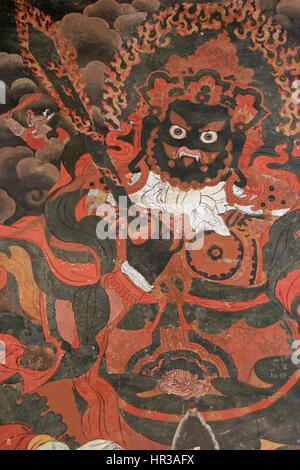 La verniciatura di una divinità in Simtokha dzong in Thimphu (Bhutan). Foto Stock