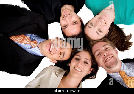Team aziende lavoro - teste insieme su uno sfondo bianco Foto Stock