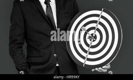 Abito uomo Freccette Bullseye Concept Foto Stock