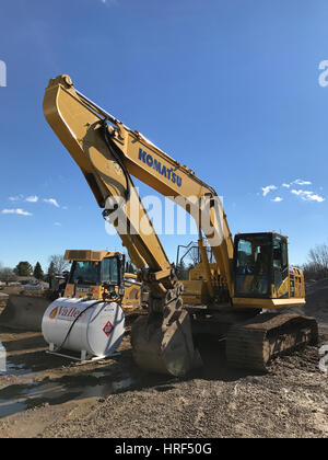 Escavatore a sito in costruzione. Foto Stock