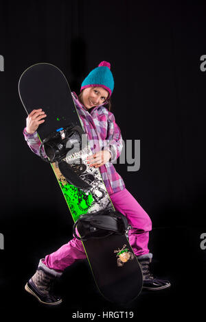 Una donna con lo snowboard Foto Stock