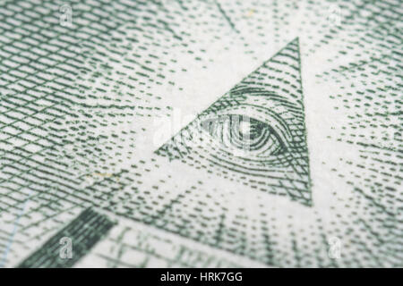 Clos dettaglio macro foto di US 1 / una banconota da Dollaro / Bill and Eye. Per l'economia americana, il commercio, il tasso di cambio di valuta, un dollaro nota USA. Foto Stock