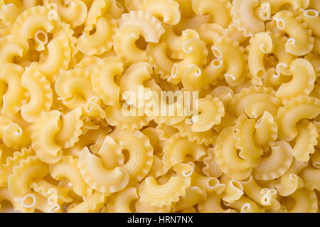 Creste di gallo pasta close up sullo sfondo Foto Stock