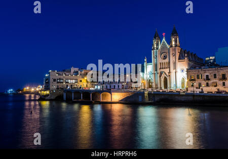 Tramonto sulla chiesa di Balluta - Saint Julian Malta Foto Stock