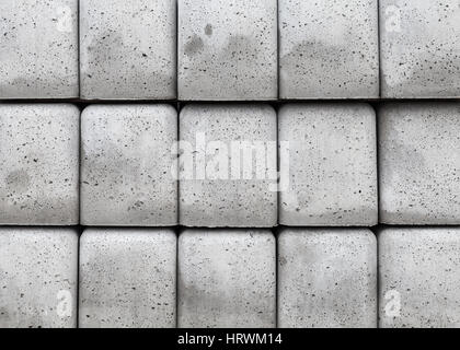 Pila di grigio di blocchi in calcestruzzo, abstract background industriale texture foto Foto Stock