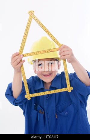 Junge als Handwerker, Bauarbeiter, Symbolbild Hausbau - little boy come costruzione di lavoratore Foto Stock