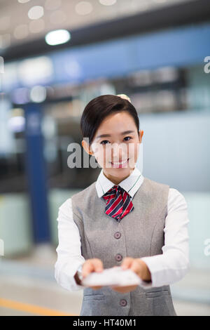 Sorridenti hostess della compagnia aerea Foto Stock