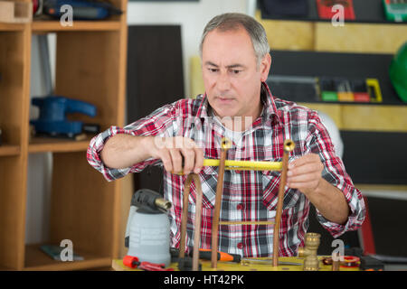 Artigianale tubo di sezionatura Foto Stock