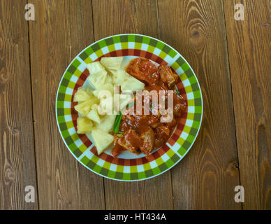 Dolce e aspro di maiale con salsa di ananas Foto Stock