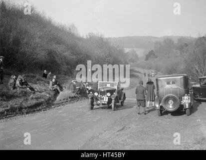 Riley ha aperto 4 posti tourer presso la JCC prova di mezza giornata, Ranmore comune, Dorking, Surrey, 1930. Artista: Bill Brunell. Foto Stock