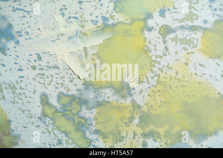 Giallo e grigio astratto di vernice su metallo Foto Stock