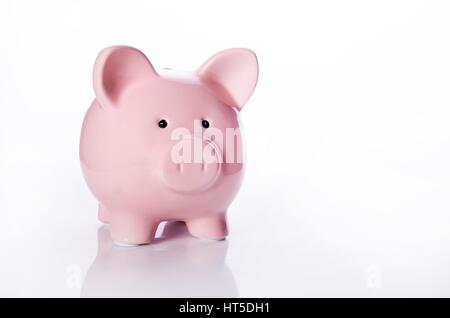 Piggybank isolati su sfondo bianco Foto Stock