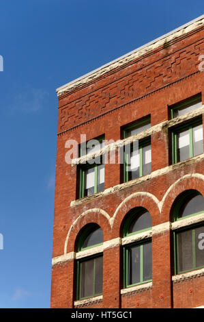 Facciata di stile vittoriano edificio di mattoni rossi nella storica Pioneer Square District di Seattle, Washington, Stati Uniti d'America Foto Stock