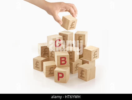 Sterlina inglese di concetto di denaro su sfondo isolato. Foto Stock