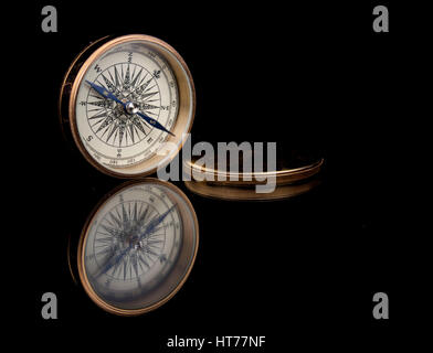 Golden Compass e riflettere Foto Stock