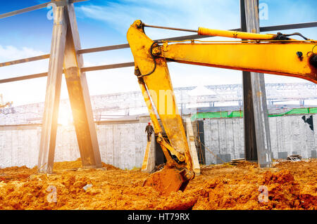 Close-up di un sito in costruzione escavatore Foto Stock