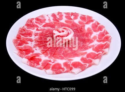 Fetta di maiale per lo shabu ordine impostato da manu foto in studio di illuminazione. Foto Stock