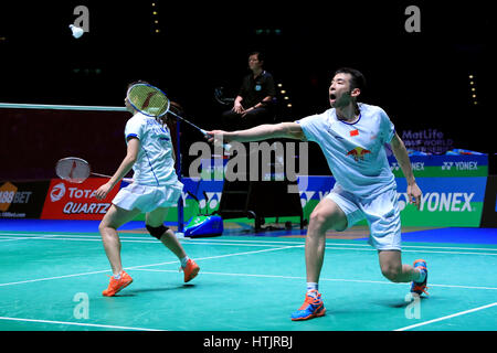 Della Cina di Kai Lu e Yaqiong Huang (nella foto) contro Malaysia Peng presto Chan e Liu Ying Goh nel misto doppie finali durante il giorno 6 dell'Overgrip Yonex tutti Inghilterra aprire Badminton campionati a Barclaycard Arena, Birmingham. Foto Stock