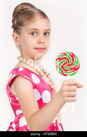 Ragazza mostra una splendida e grande candy Foto Stock