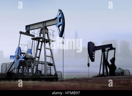 Lavorando vecchie pompe olio in luogo rurale contro la fabbrica Foto Stock