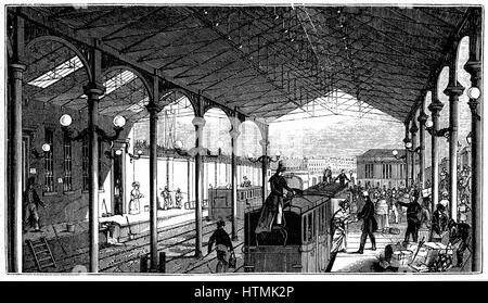 La stazione di Euston, London terminus di Londra e la stazione ferroviaria di Birmingham: uomo saluta passeggero femmina mentre i bagagli sul tetto è svincolato. Ingegnere: Robert Stephenson. Da "di Londra e la stazione ferroviaria di Birmingham " Guida di Londra. 1840. Ferro da stiro pilastri e travi Foto Stock