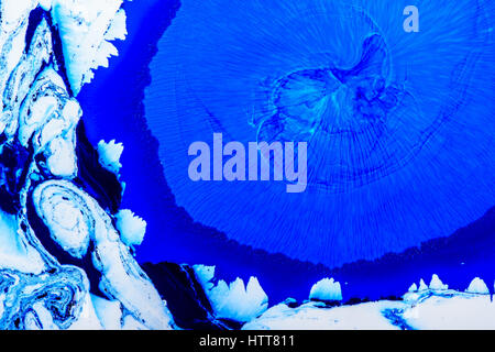 Abstract il colore di sfondo di vernice flussi misti. Vernice misti sullo sfondo. Foto Stock