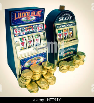 Due giocattolo vintage slot machines con denaro in oro Foto Stock