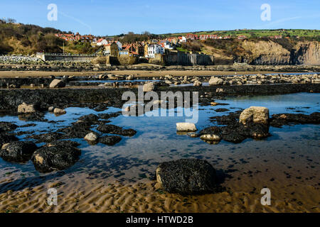 Bassa marea a Robin cappe bay North Yorkshire Foto Stock