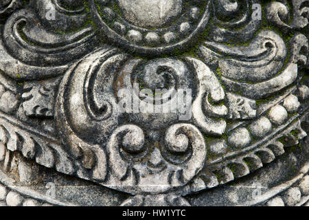 Il modello sulla pietra è un ingrandimento di un tempio Balinese Foto Stock