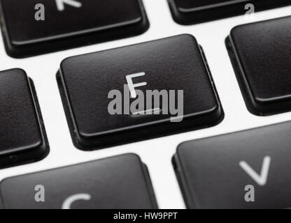 Chiusura del tasto home che mostra bump sulla lettera F Foto Stock