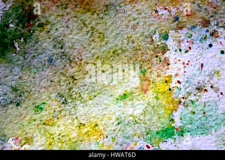 Macchie colorate di acquerello su carta testurizzata – sfondo artistico Foto Stock