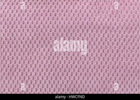 Sfondo rosa da morbido tessuto morbido closeup. Texture di macro di tessili. Foto Stock