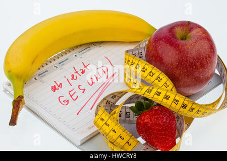 La dimensione del nastro con frutta, Massband mit Obst Foto Stock