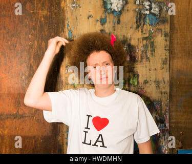 Ritratto di ragazzo adolescente con red afro capelli Foto Stock