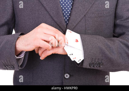 Imprenditore con carte da gioco nascosto sotto il manicotto. Foto Stock