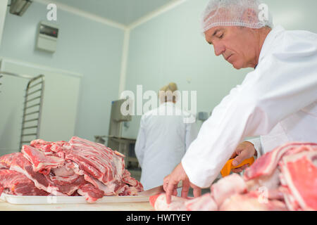 Preparazione di carne Foto Stock