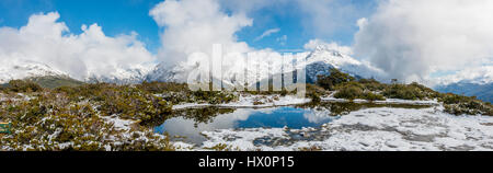 Neve sul vertice del Vertice chiave, Mt. Christina, Parco Nazionale di Fiordland, West Coast, a Southland, Nuova Zelanda Foto Stock