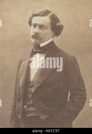 "Francis Wey par Nadar" è una fotografia scattata dal famoso fotografo francese Nadar. L'immagine ritrae Francis Wey, una figura chiave nei circoli intellettuali francesi del XIX secolo. Il ritratto di Nadar cattura la personalità e lo status sociale di Wey con chiarezza, tipica del suo stile fotografico. Foto Stock