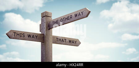 Il bivio signpost dicendo questo modo, in questo modo, l'altro modo concetto per perso, confusione o decisioni Foto Stock