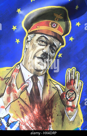 Londra, Regno Unito. 25 Mar, 2017. Una caricatura dell ex leader dell'UKIP Nigel Farage vestito in uniforme nazista come migliaia di prendere parte in marzo a nel centro di Londra contro Brexit come parte di Unite per l'Europa come Primo Ministro Theresa Maggio si prepara ad attivare l'articolo 50 su 29 Marzo per iniziare il processo di Gran Bretagna il ritiro dall'Unione europea Credito: amer ghazzal/Alamy Live News Foto Stock