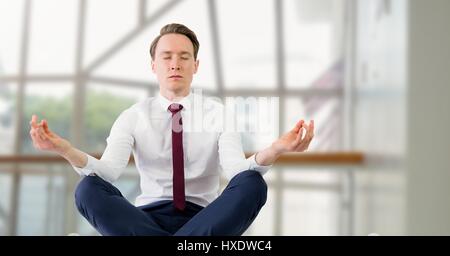 Composito Digitale di imprenditore meditando da windows office Foto Stock