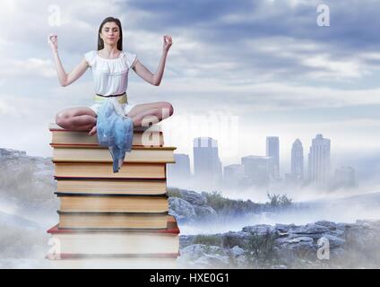 Composito Digitale della donna la meditazione seduta meditando su Libri impilati da città distanti Foto Stock