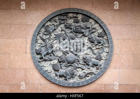 Pannello di Lions in Jing An Tranquility tempio - Shanghai, Cina Foto Stock