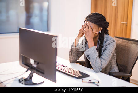 Non riesce a sopportare questo più di lavoro Foto Stock