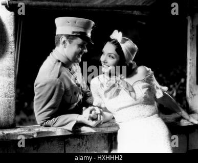 LAWRENCE TIBBETT, LUPE VELEZ, il cubano Love Song, 1931 Foto Stock