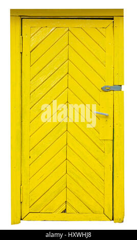 Giallo vecchia porta di legno in un mattone rustico capannone. La porta era appena verniciato vernice ywellow.isolato Foto Stock